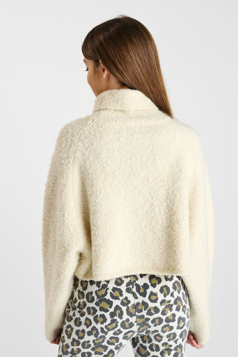 Pull col roulé beige